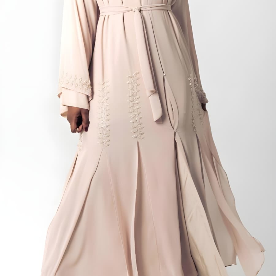 A customer in the Layla abaya in sand